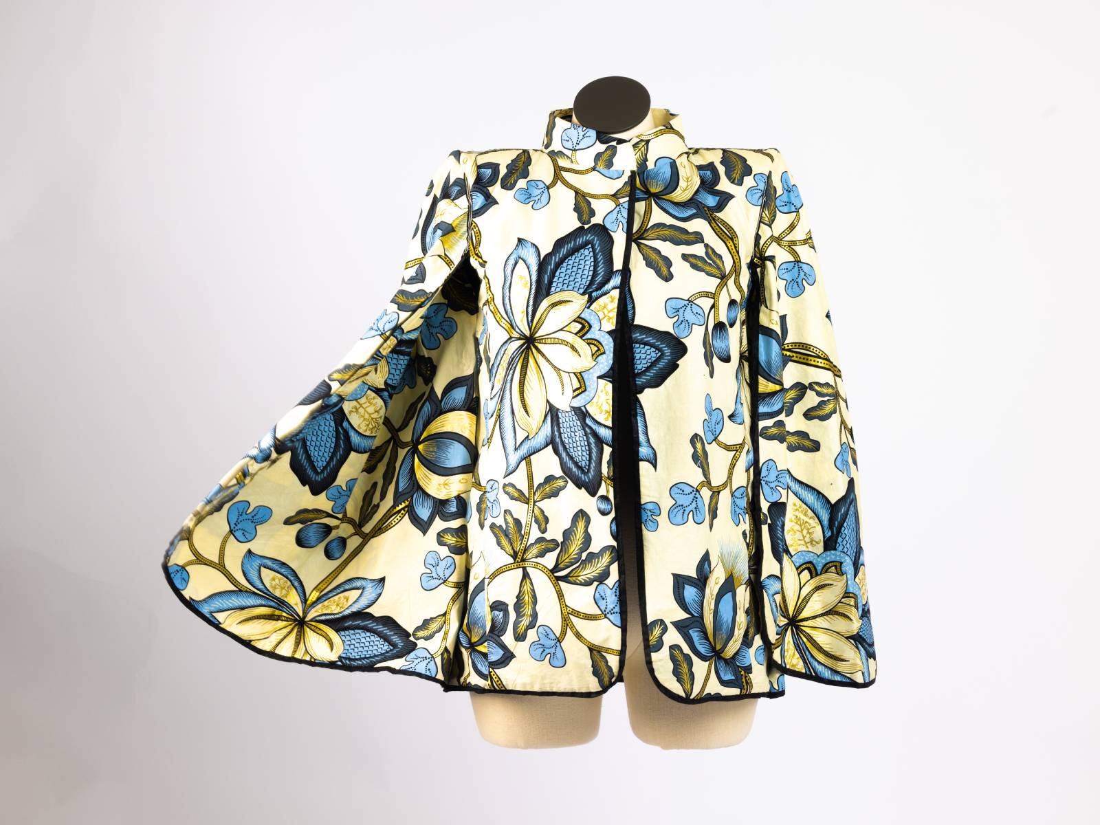 Cream floral patterned open cape blazer, front view, open