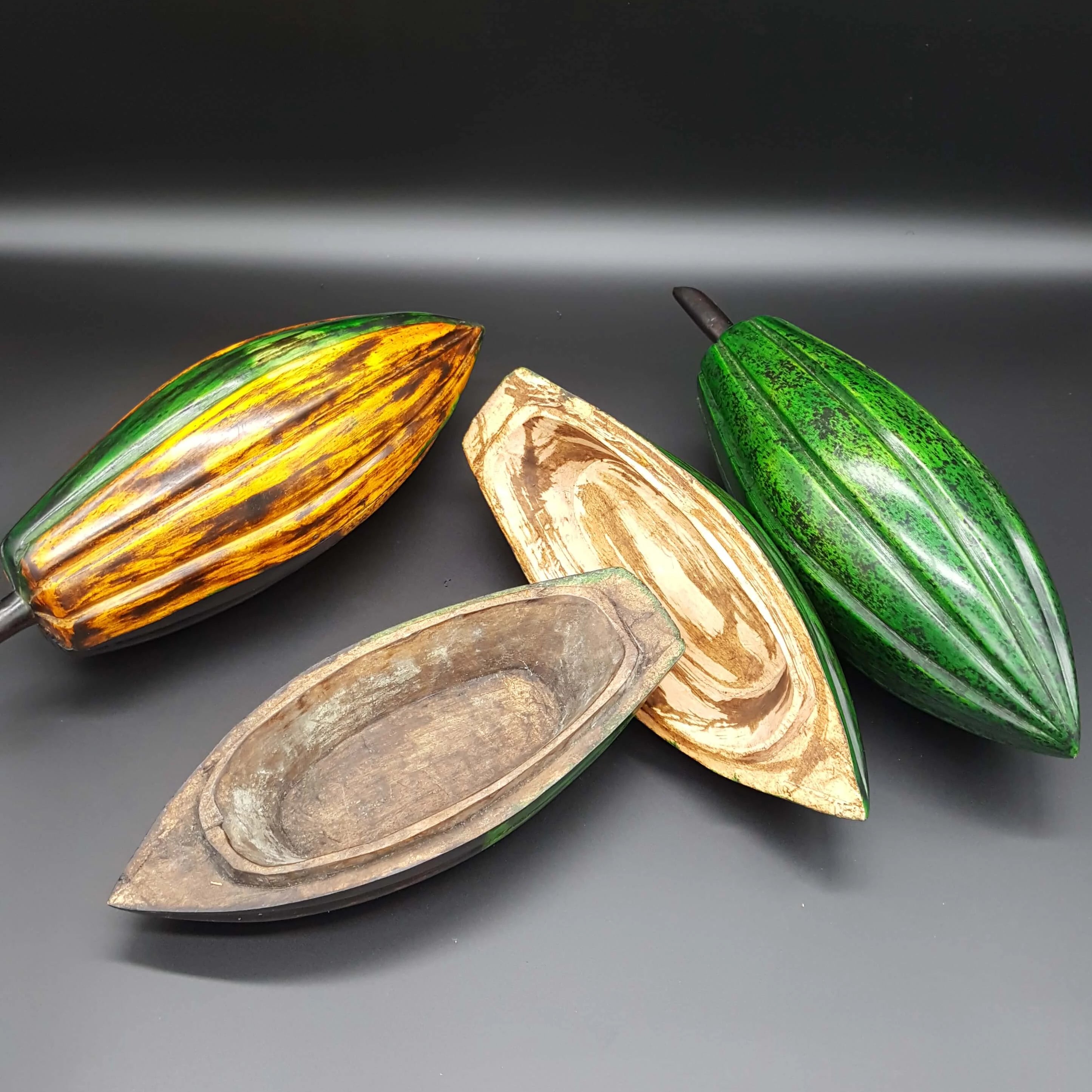 Jewelry Cocoa Pods, carved from native sese wood.