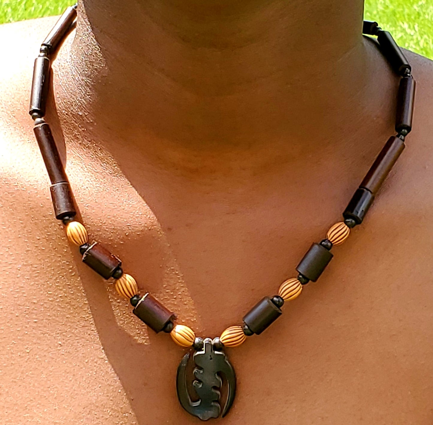 Gye nyame wooden pendant, beaded necklace