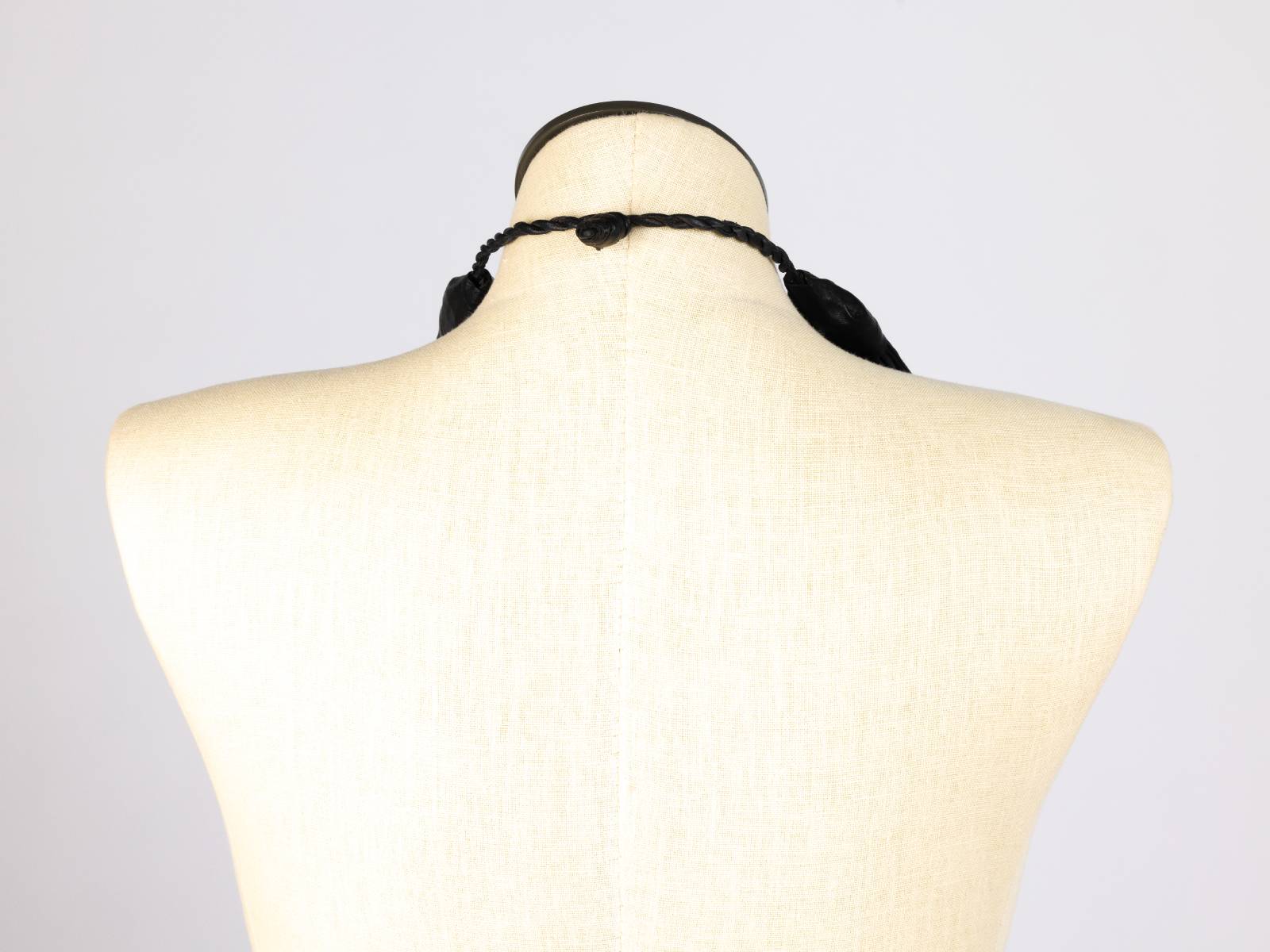 Black strand leather collar, back view