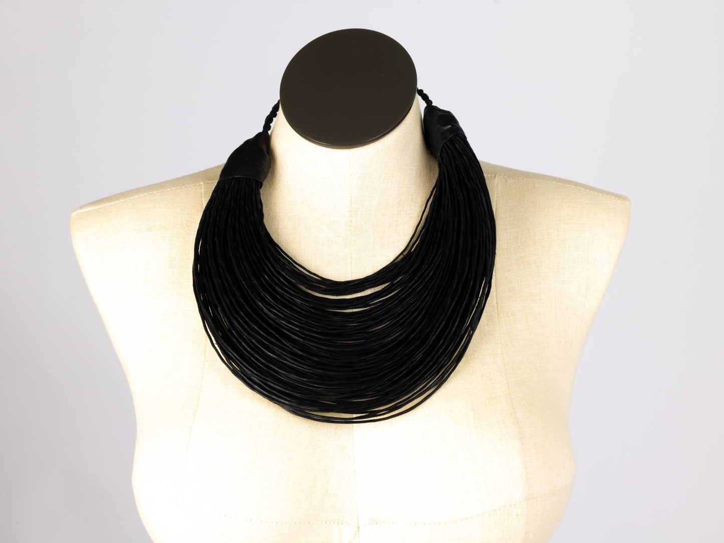 Black strand leather collar, front view